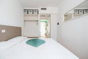 Tempat tidur dalam kamar di Appartamento Torrioni - by Casêta