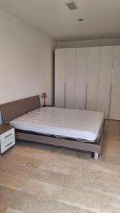 Posteľ alebo postele v izbe v ubytovaní Appartamento Luminoso