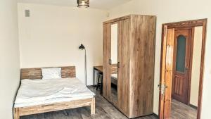 Postel nebo postele na pokoji v ubytování Guest House Kamara