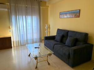 A seating area at Apartamentos Torr en Madrid - Chamartín