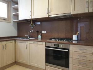 Kuchyň nebo kuchyňský kout v ubytování Sesimbra California Beach Apartment + 15 fotografií