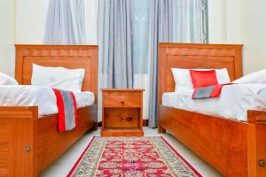 Ένα ή περισσότερα κρεβάτια σε δωμάτιο στο Jaanst Holiday Homes-Sunset