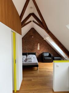 Ein Bett oder Betten in einem Zimmer der Unterkunft Moderne Apartments in attraktivem Altbau
