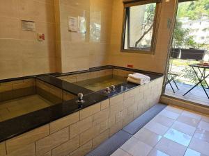Imagem da galeria de Wulai Shui An Hot Springs em Wulai