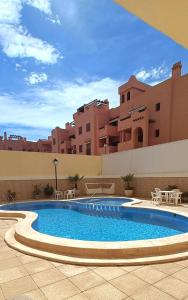 Bazén v ubytovaní Apartament Casa Milo playa Los Locos alebo v jeho blízkosti