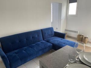 Posedenie v ubytovaní 2 pièces avec parking en Coeur de Ville - Appartement lumineux et calme