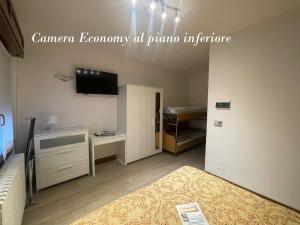 Postel nebo postele na pokoji v ubytování Hotel Sciatori 3 Stelle Superior