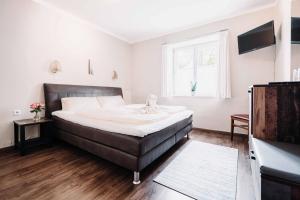 Postel nebo postele na pokoji v ubytování Gasthof Greimel