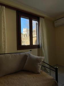 Postel nebo postele na pokoji v ubytování Οι Φωλίτσες