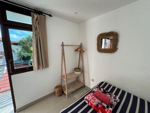 Postel nebo postele na pokoji v ubytování Surf Bali Villa