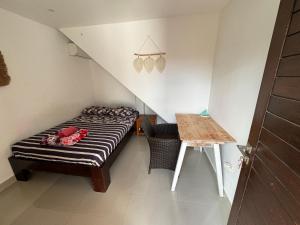 Postel nebo postele na pokoji v ubytování Surf Bali Villa