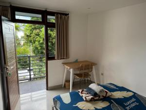 Postel nebo postele na pokoji v ubytování Surf Bali Villa