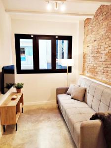 ARIQUS Fira Apartments的休息区