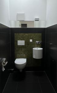 Ein Badezimmer in der Unterkunft Moderne Apartments in attraktivem Altbau
