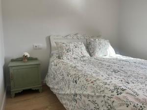 Postel nebo postele na pokoji v ubytování Casa Catalina - Ribeira Sacra