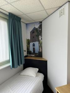 Postel nebo postele na pokoji v ubytování Hotel Hoogeerd by Flow Niftrik - Nijmegen