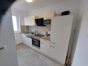 Kuchyňa alebo kuchynka v ubytovaní Appartements Bleistattblick