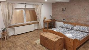 Posteľ alebo postele v izbe v ubytovaní Apartmán Anglický roh