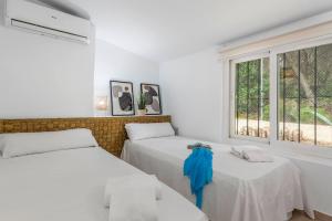 A bed or beds in a room at Villa Anna - PlusHolidays