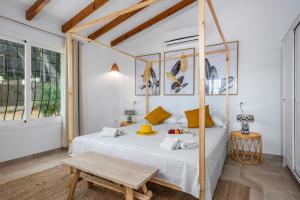 A bed or beds in a room at Villa Anna - PlusHolidays