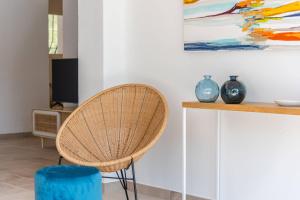 A television and/or entertainment centre at Villa Anna - PlusHolidays