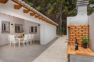 A balcony or terrace at Villa Anna - PlusHolidays