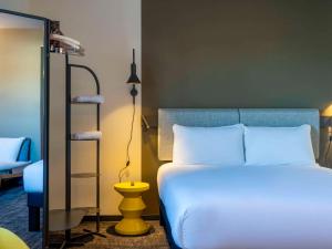 Postel nebo postele na pokoji v ubytování ibis Saint Paul Trois Chateaux