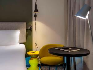 Postel nebo postele na pokoji v ubytování ibis Saint Paul Trois Chateaux