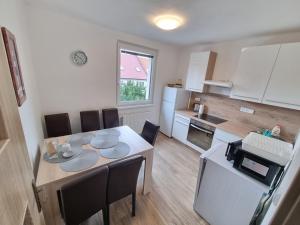 Kuchyň nebo kuchyňský kout v ubytování Apartmany Star