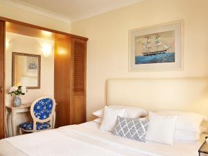 Posteľ alebo postele v izbe v ubytovaní Grecotel Marine Palace & Aqua Park