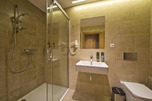 Koupelna v ubytování Hotel Lesna – Adult Friendly + 30 fotografií