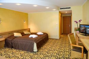 Letto o letti in una camera di Hotel Brimer