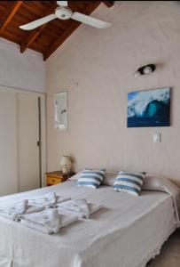 Una cama o camas en una habitación de Apart La Posada del Mar