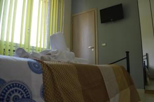 Postel nebo postele na pokoji v ubytování Casa Aurora B&B