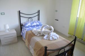 Postel nebo postele na pokoji v ubytování Casa Aurora B&B