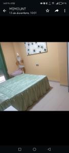 a picture of a bedroom with a bed with a window at El MIRADOR DE LA PLAYA in Melilla