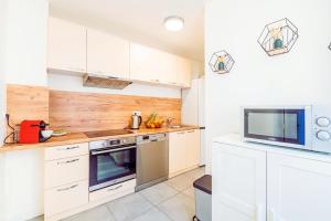 Een keuken of kitchenette bij NOTRE DAME - Hypercentre - Idéal Business & Famille - 3 lits