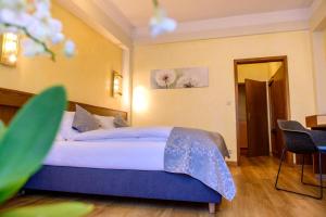 Letto o letti in una camera di Hotel Brimer