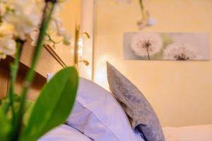 Letto o letti in una camera di Hotel Brimer