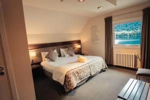 Postel nebo postele na pokoji v ubytování Hotel Puerto Blest