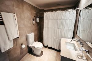 Koupelna v ubytování Hotel Puerto Blest