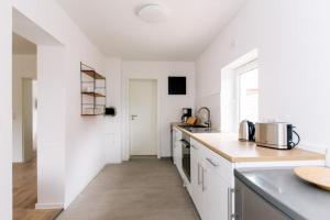 A cozinha ou cozinha compacta de Landliebe im Ferienobjekt "Landwohnung"