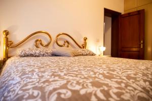Tempat tidur dalam kamar di Casa degli Affreschi Tuscany