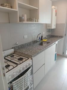 Køkken eller tekøkken på Rio Apart Neos Park