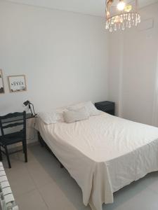 En eller flere senge i et værelse på Rio Apart Neos Park