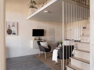 TV a/nebo společenská místnost v ubytování Waterfront Cabins