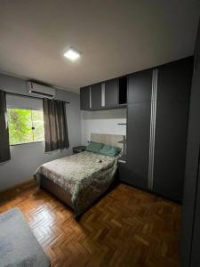 A bed or beds in a room at Casa para locação no período da Tecnoshow Comigo 2024