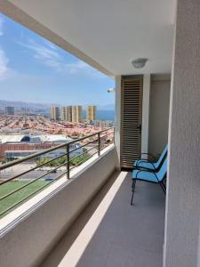 a balcony with a view of the city at El Faro Antofagasta in Antofagasta