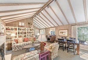 a living room with a couch and a table at 3903 Mabuhay home in Carmel