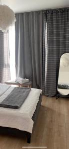 Posteľ alebo postele v izbe v ubytovaní Smart Residence